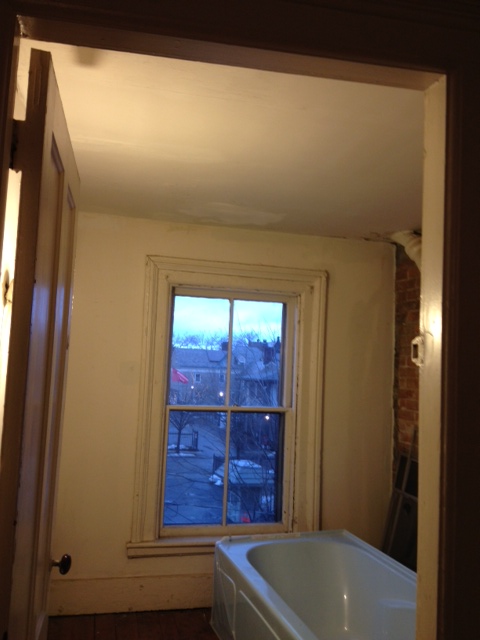 Bathroom Before: View of window, wall, and ceiling.